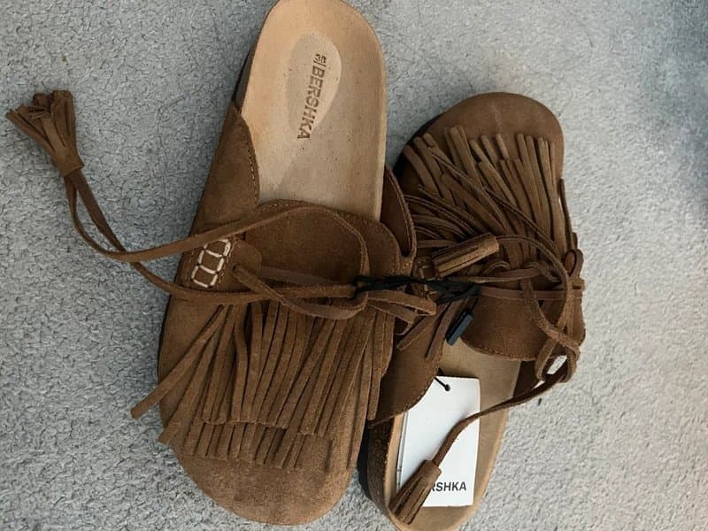 Bershka Bershka flat leather clogs with fringe detail in brown