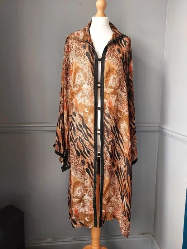 The Unbranded Brand Cover Up animal print 16 18 20