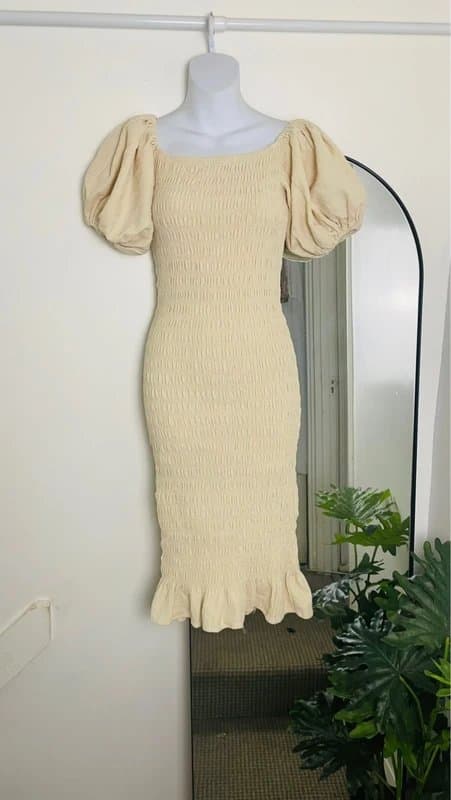 Never Fully Dressed Never Fully Dressed cream-colored ruched dress featuring puff sleeves | size M