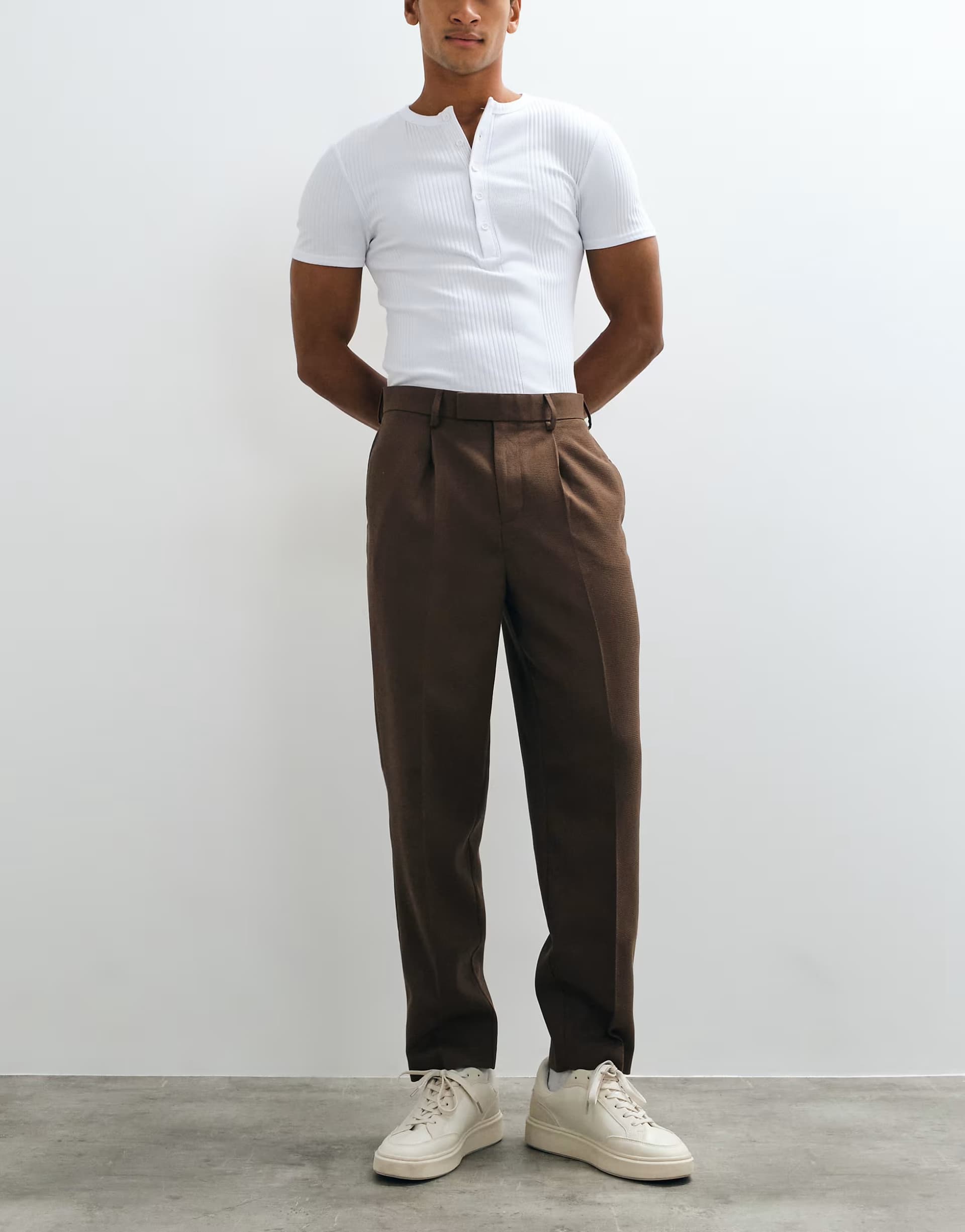 ASOS ASOS DESIGN tailored pleated relaxed tapered trousers in brown microtexture