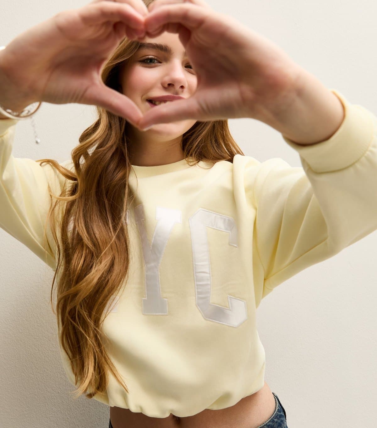 New Look New Look Light Yellow NYC Logo Bubble Hem Sweatshirt