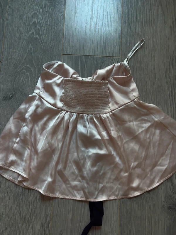 Urban Outfitters Kimchi Blue baby pink satin babydoll with black tie