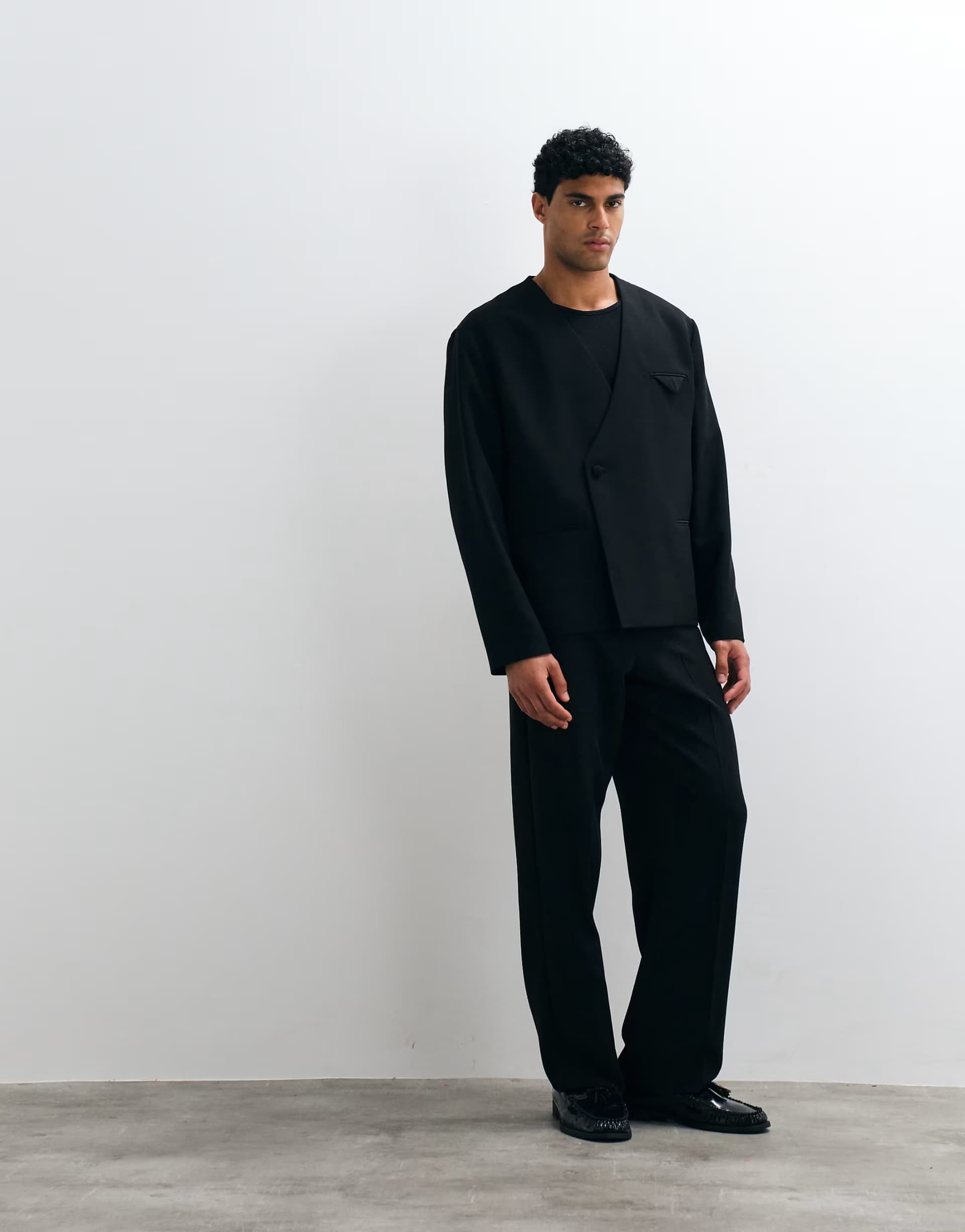 ASOS ASOS DESIGN wide tuxedo suit trouser with side tape detail in black