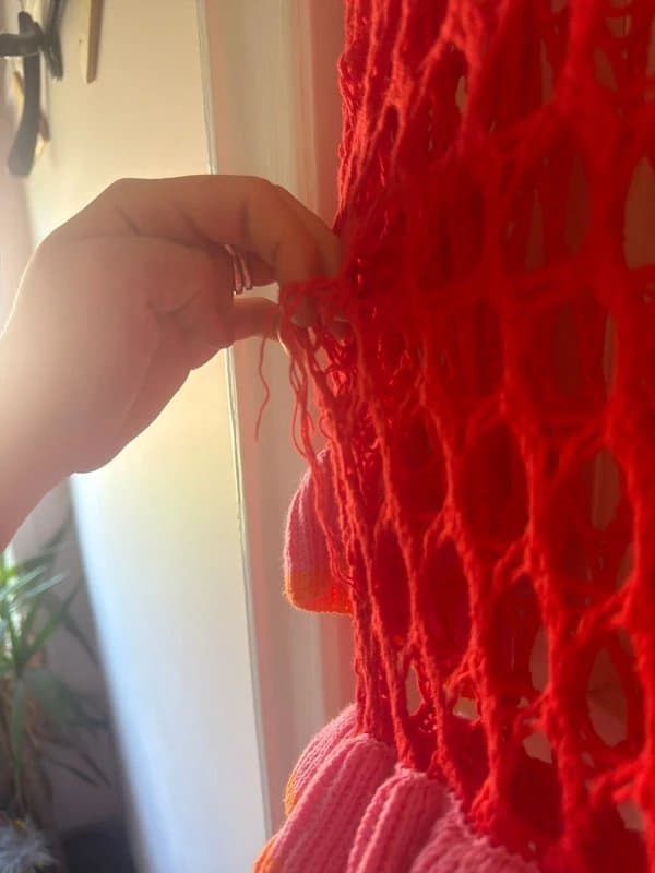 Never Fully Dressed Never fully dress size L/XL crocheted red and pink dress - with slight pull