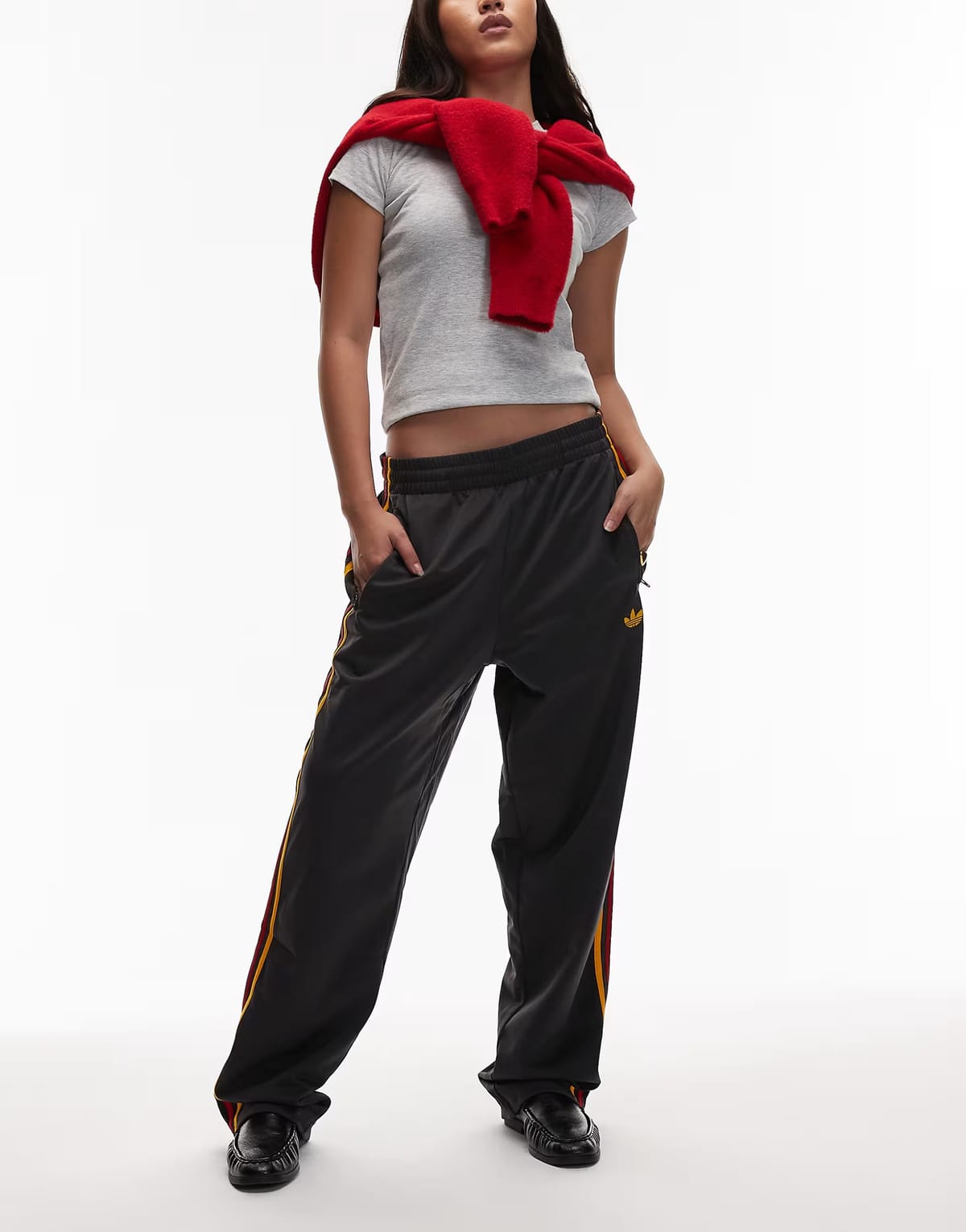 ASOS adidas Originals firebird track pants in black and gold - 1
