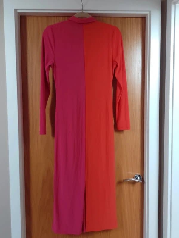 Never Fully Dressed Never Fully Dressed. Block zip dress