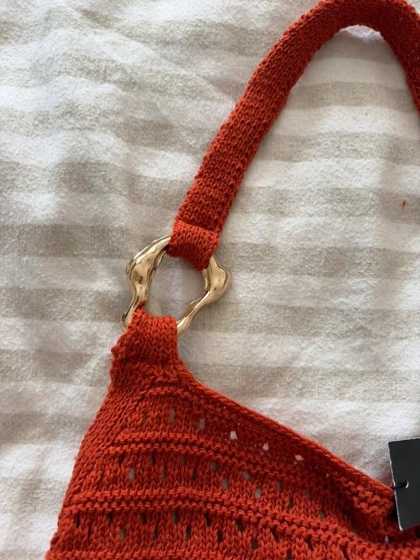 PrettyLittleThing Pretty little thing orange crochet halterneck top with gold hardware detail