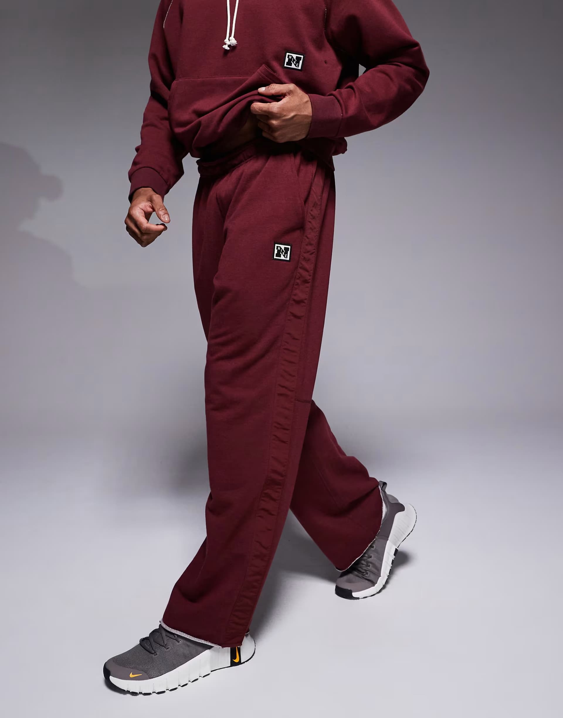ASOS Nike Training Heritage Dri-FIT joggers in red