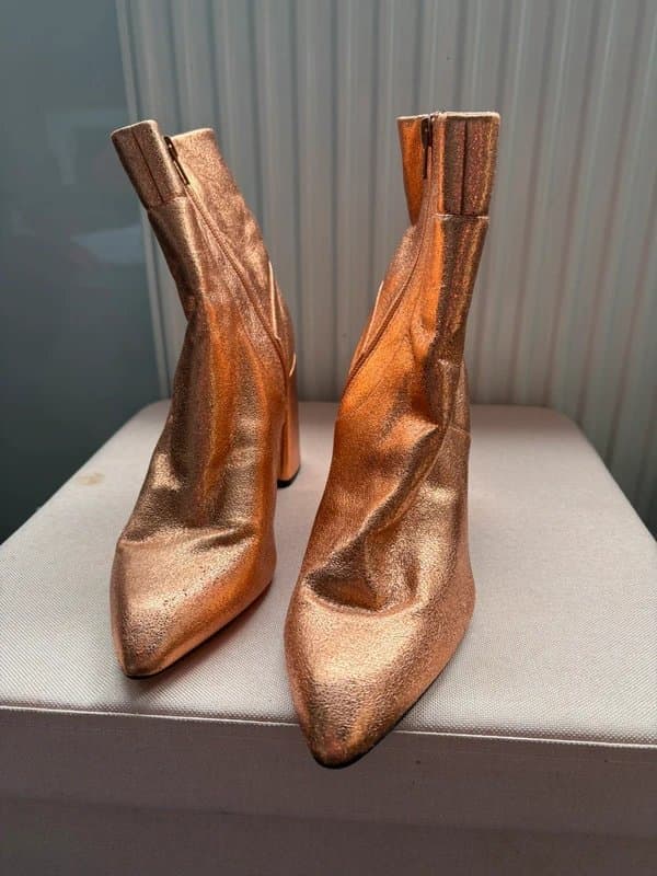 ASOS rose gold leather ankle boots featuring a pointed toe and a high block heel.