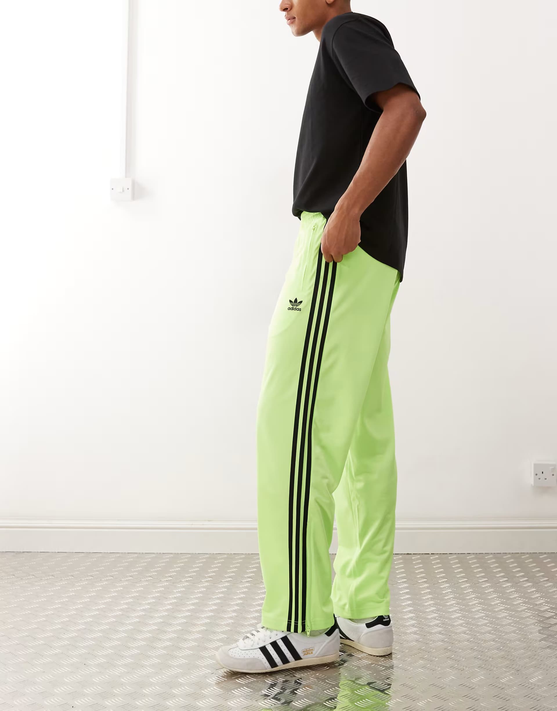 ASOS adidas Originals Firebird track pants in green and black