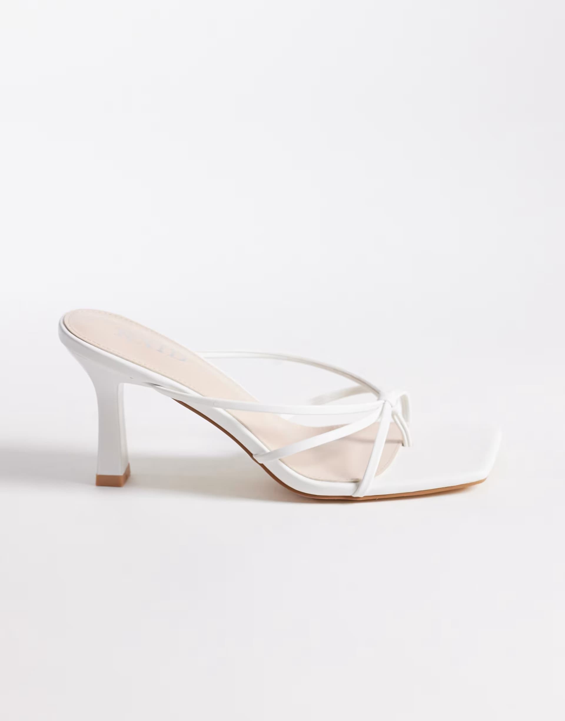 ASOS RAID Evena heeled mules in white