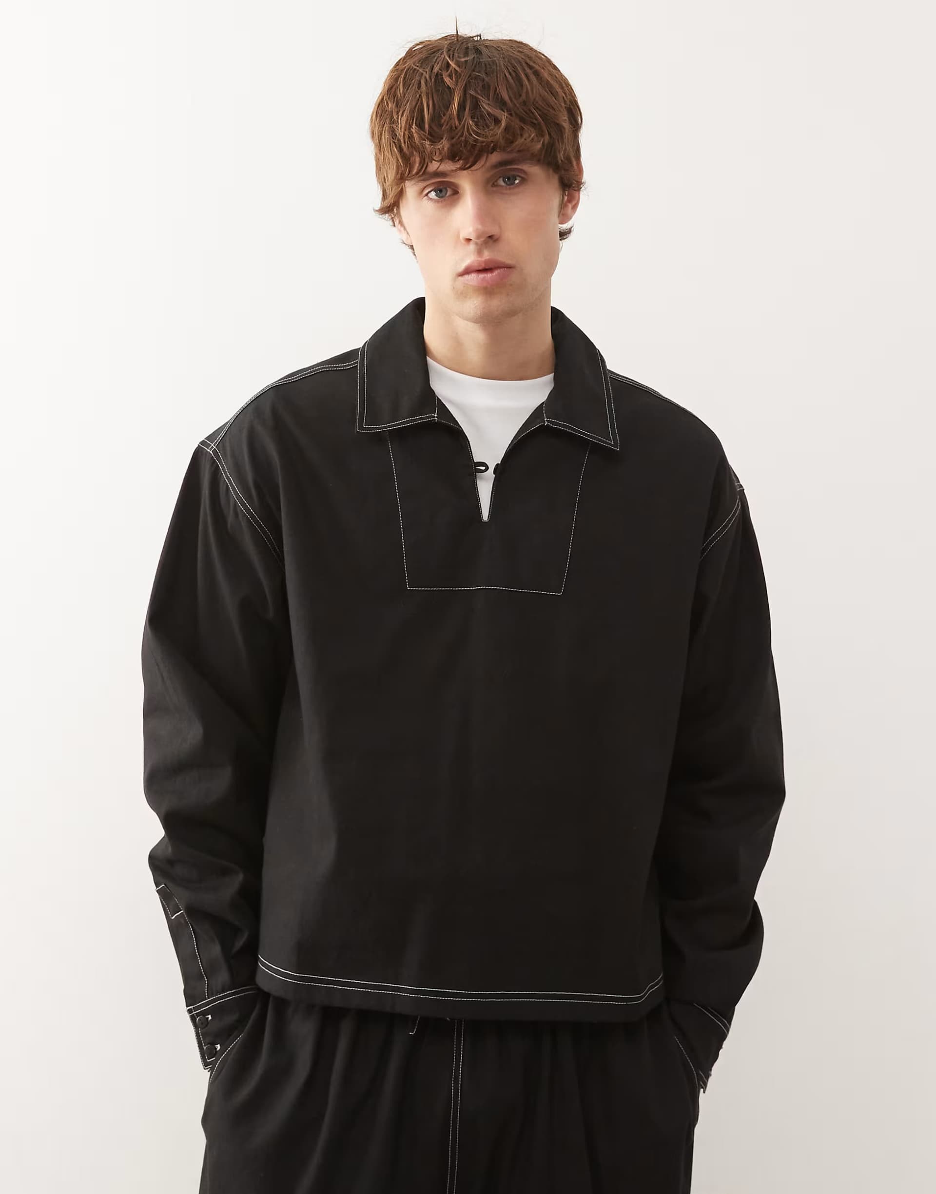 ASOS Reclaimed Vintage long sleeve pullover shirt with contrast stitching in black
