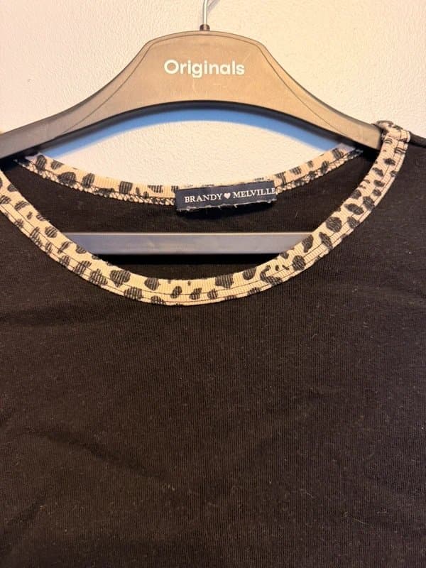 Brandy Melville brandy melville black crop top with animal print
