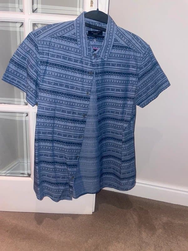 New Look Blue shirt with Aztec pattern
