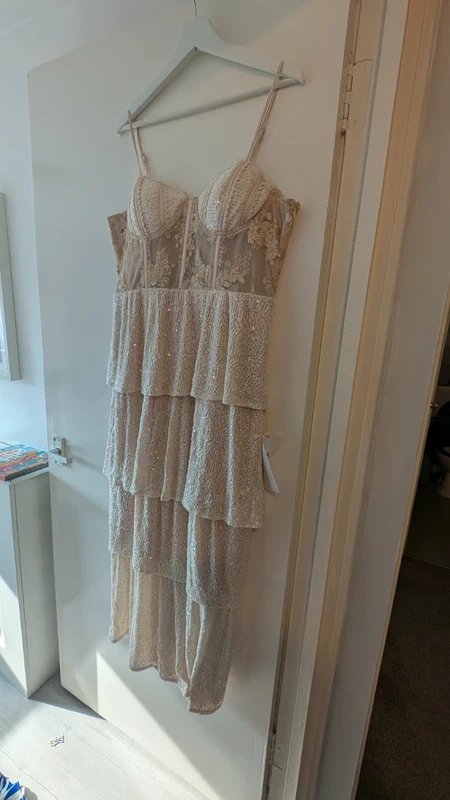 Never Fully Dressed Cream corset dress with tiered sequin bottom. - 1