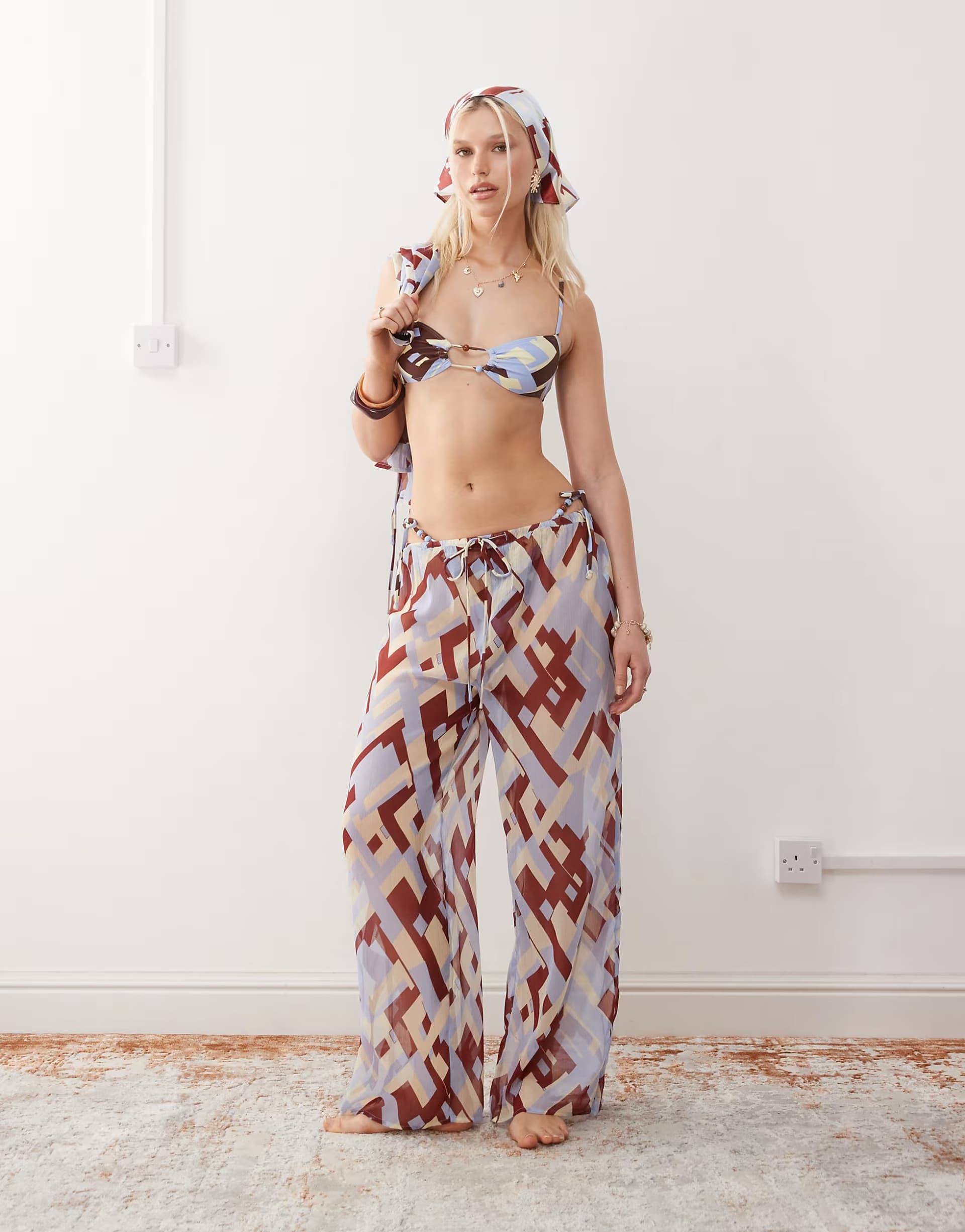 ASOS Reclaimed Vintage pull on sheer beach trouser in geo print