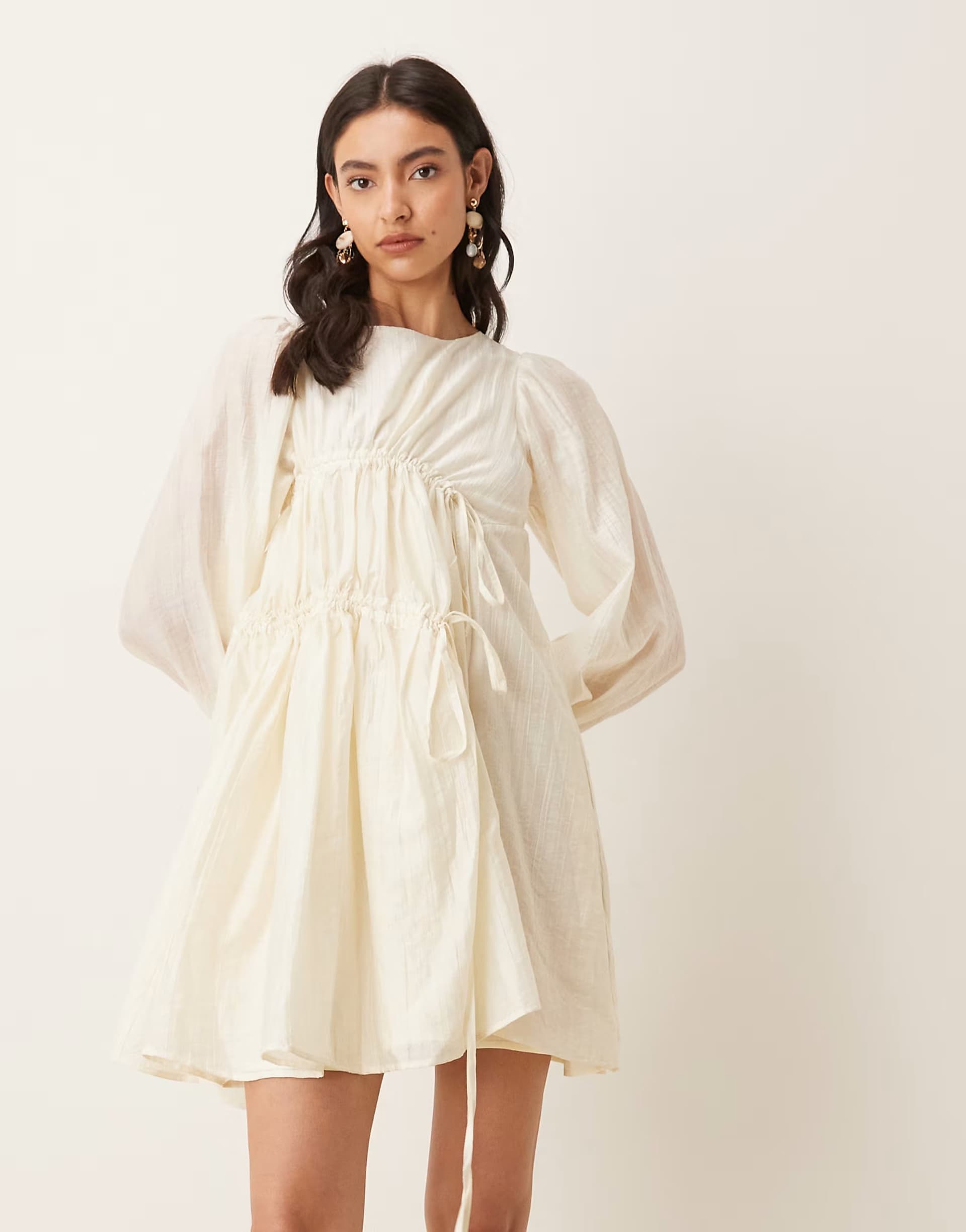 ASOS Ghospell exclusive gathered bow tie detail cinch sleeve mini dress in cream