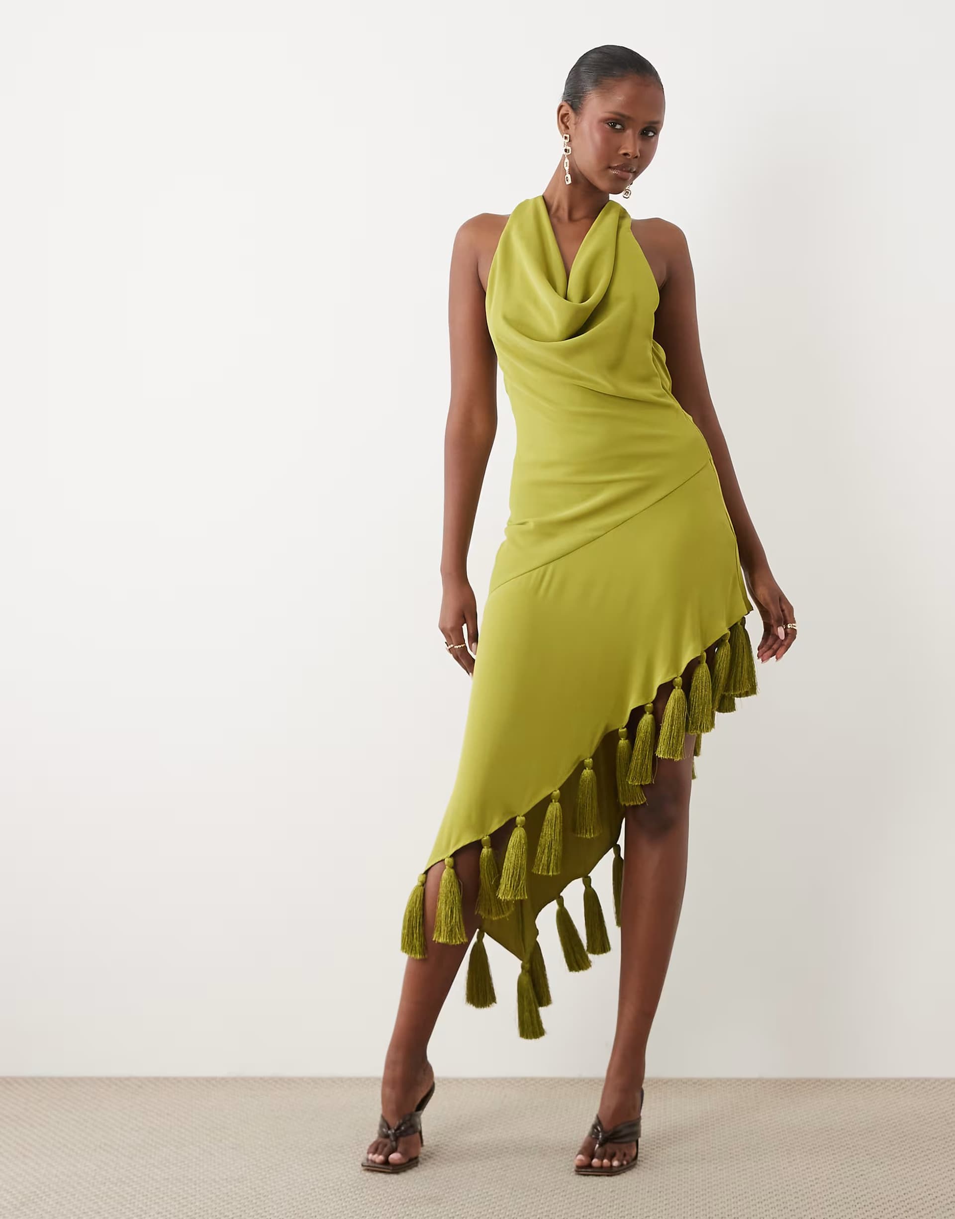 ASOS ASOS DESIGN halter neck asymmetric midi dress with tassel hem in olive green