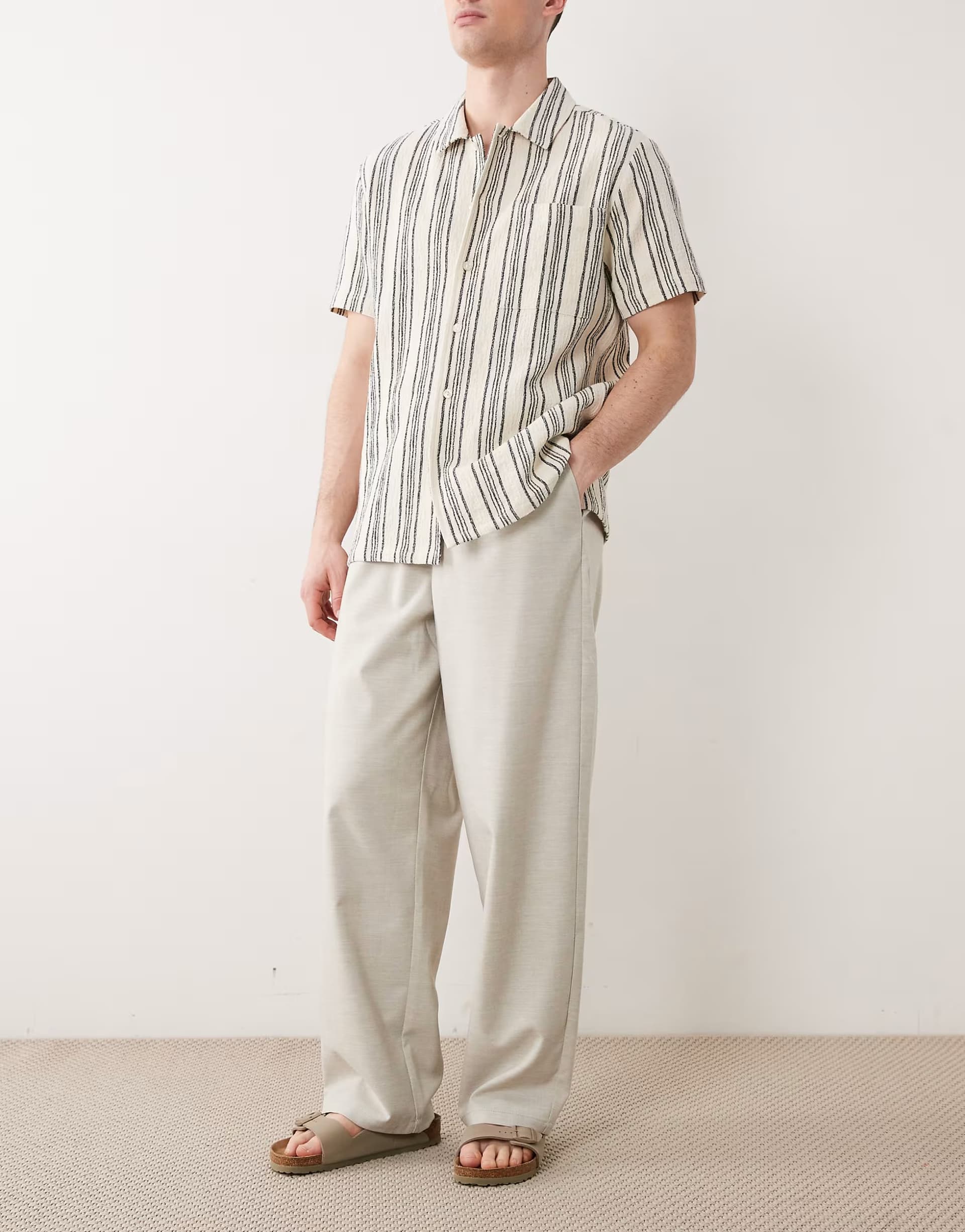 ASOS ASOS DESIGN loose straight elasticated trouser with pleat in stone herringbone