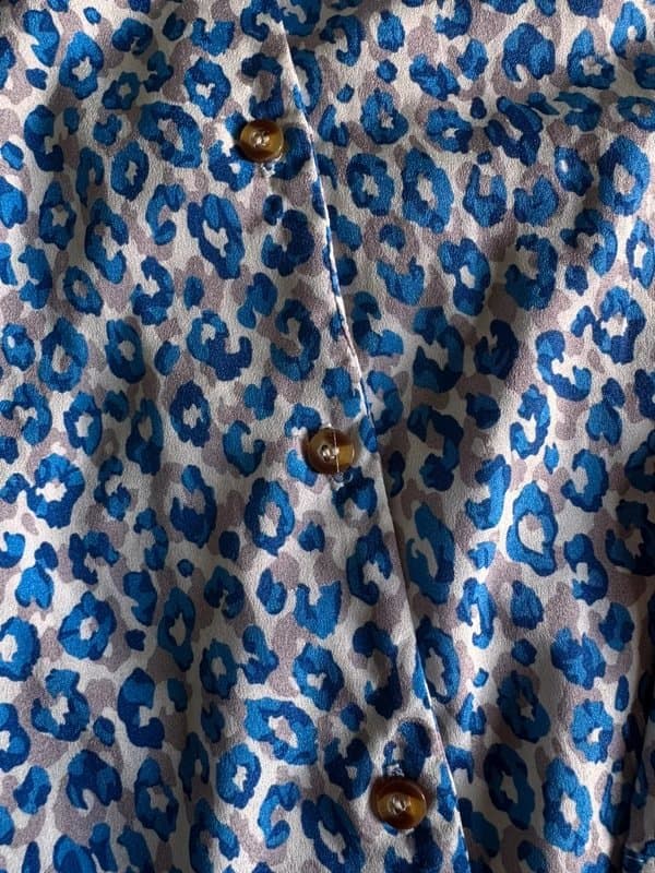 Never Fully Dressed Never fully dressed blue leopard shirt