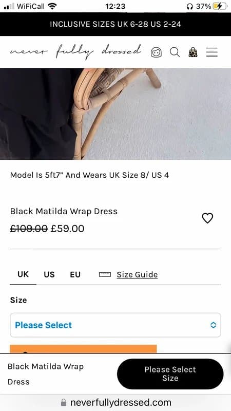 Never Fully Dressed Never fully dressed black Matilda halterneck wrap dress perfect for the party season