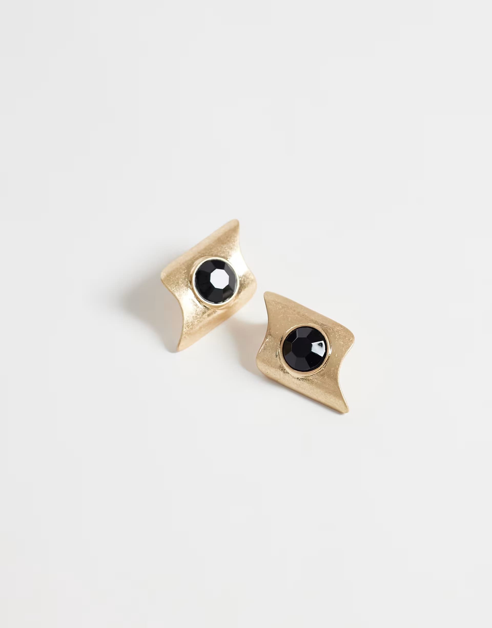 ASOS ASOS DESIGN earrings with abstract black stone-set in brushed gold tone