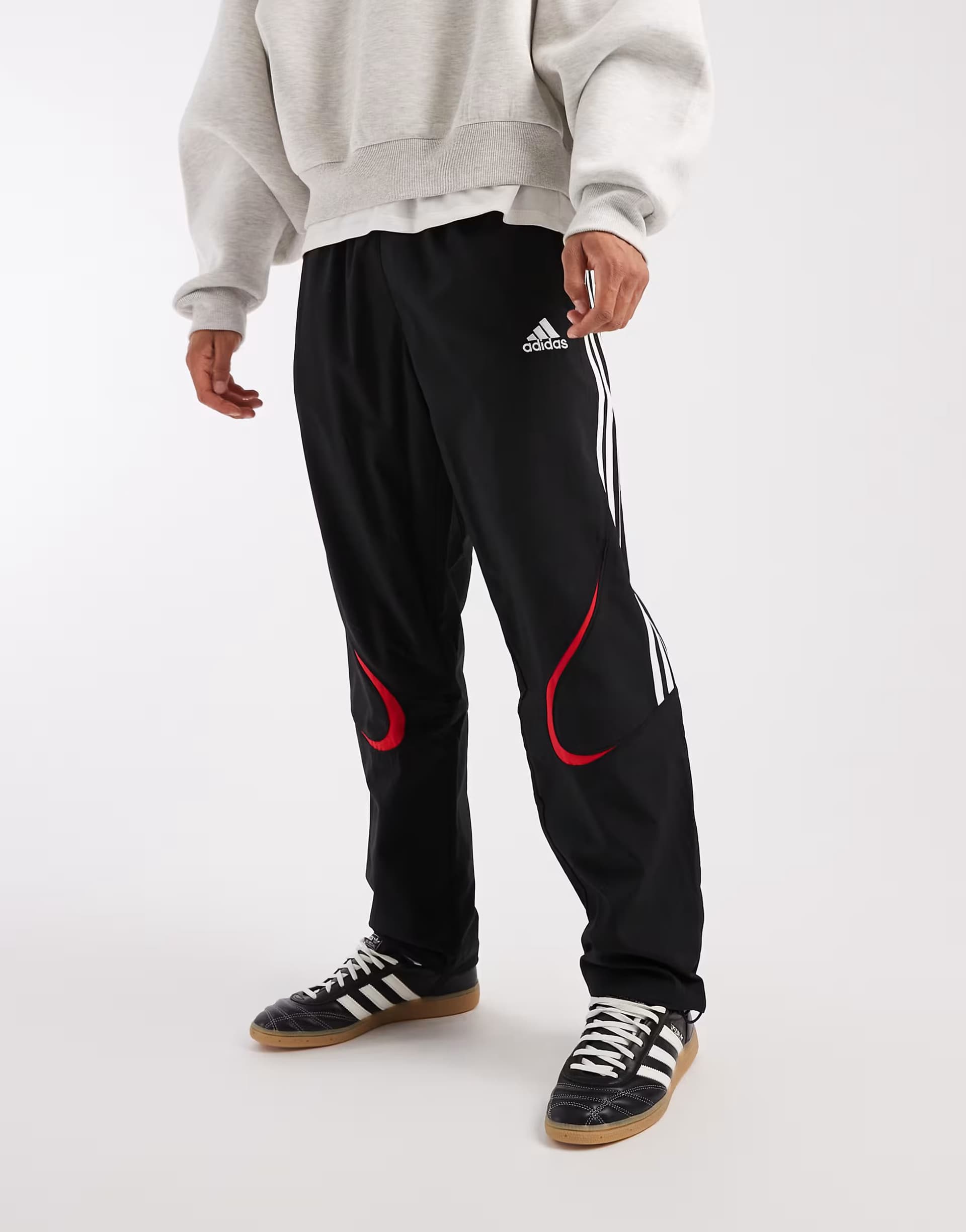 ASOS adidas Originals Teamgeist adicolor track pants in black and white