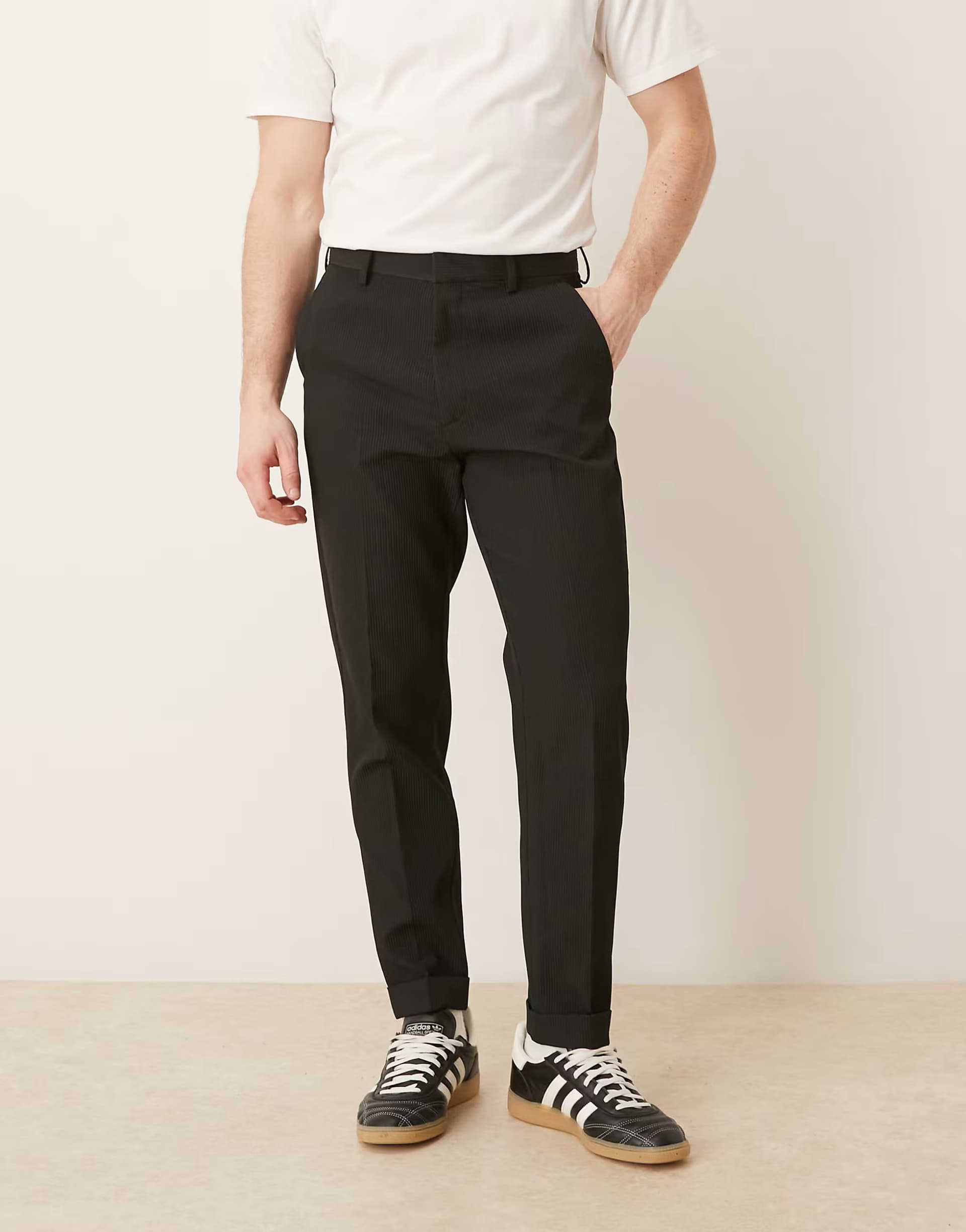 ASOS ASOS DESIGN tailored tapered comfort ribbed trousers in black with turnup