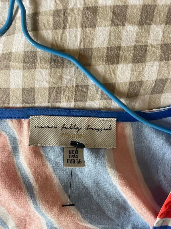 Never Fully Dressed New Never fully dressed tie-front blouse