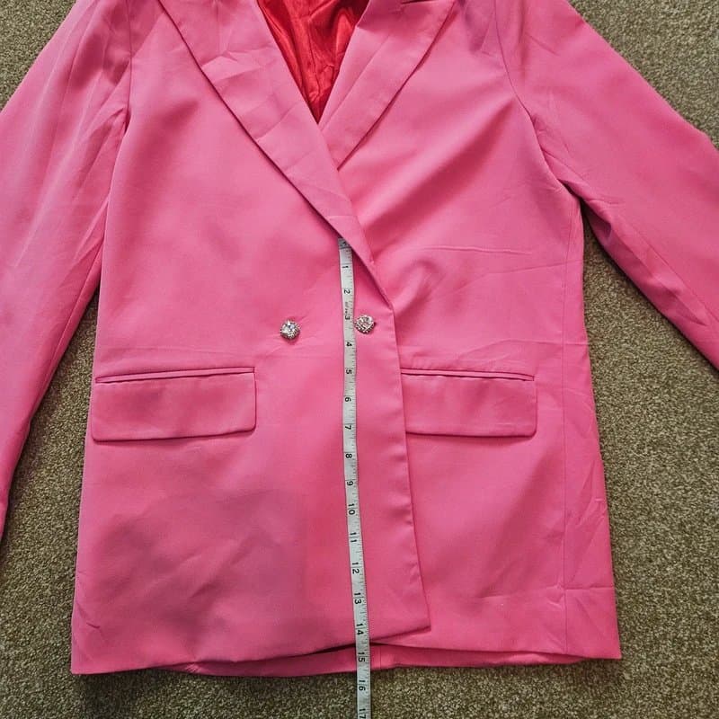 Never Fully Dressed Hot Pink Double-Breasted Blazer from the British fashion brand Never Fully Dressed.