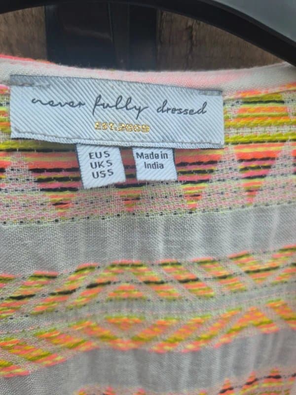 Never Fully Dressed Holiday festival cover up .