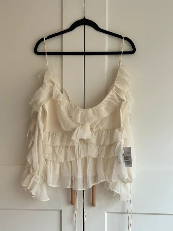 ASOS Design Off shoulder ruffle tip with tie up sleeves