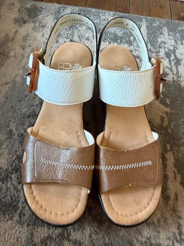 Rieker Rieker black white and tan wedge sandals. Size 6. New!