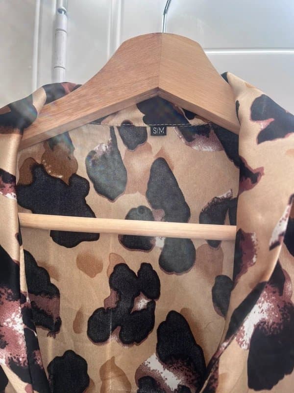 Never Fully Dressed Never fully dressed leopard print top