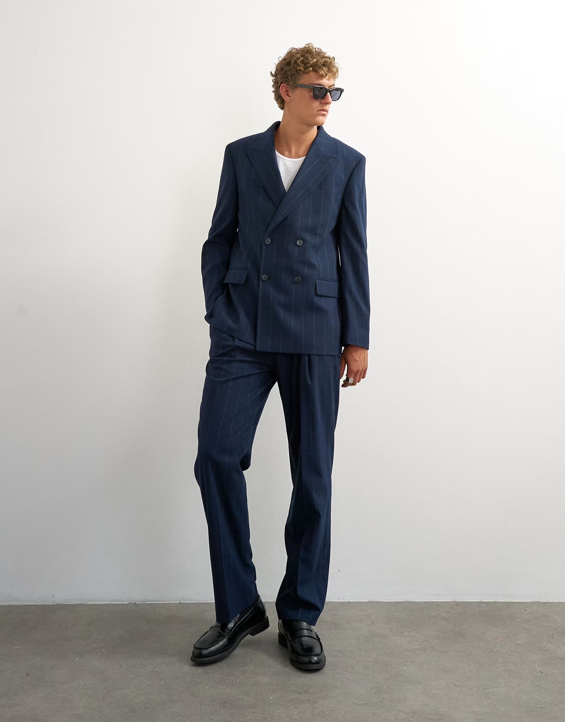 ASOS Topman relaxed fit pinstripe trousers in navy