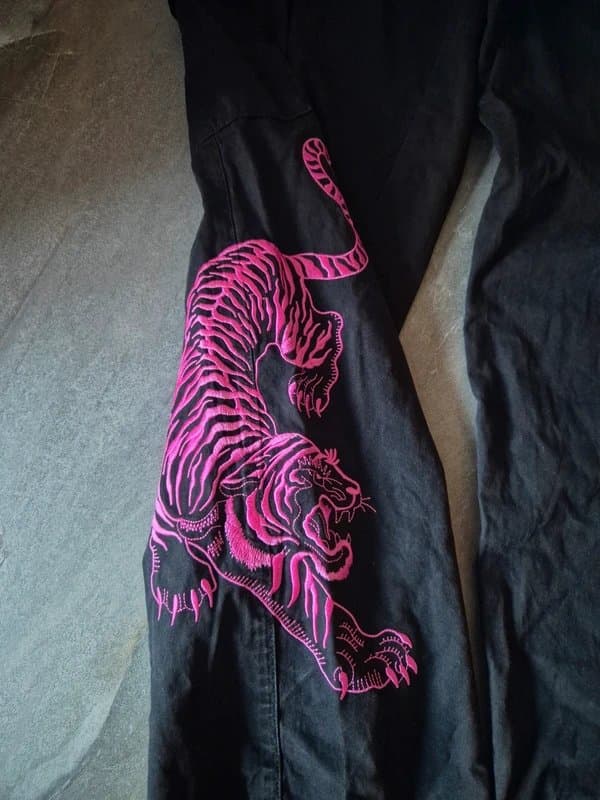 ASOS Design Black vintage cargo pants with beautiful tiger design