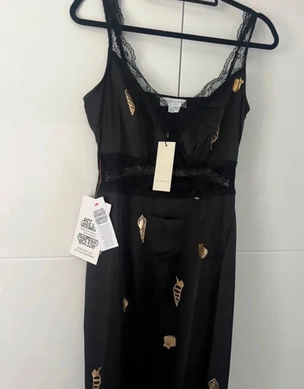 Never Fully Dressed Never fully dressed lace cut out black with gold shell design