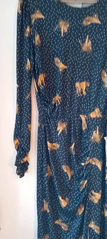 Never Fully Dressed Never fully dressed long dress. Size 8. Black, tigers and polka dots
