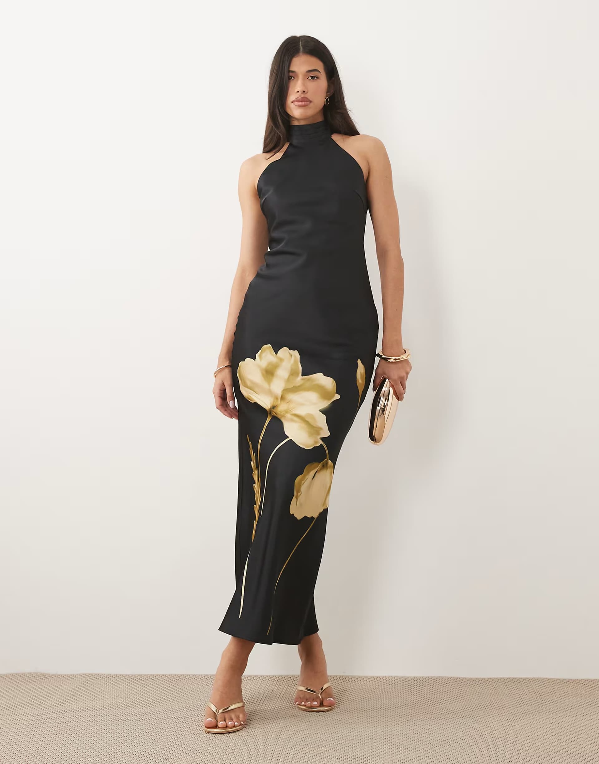ASOS Pretty Lavish Kiara satin halter neck open back maxi dress in black and gold poppy floral 