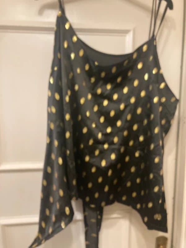 Never Fully Dressed Never fully dressed camisole top.