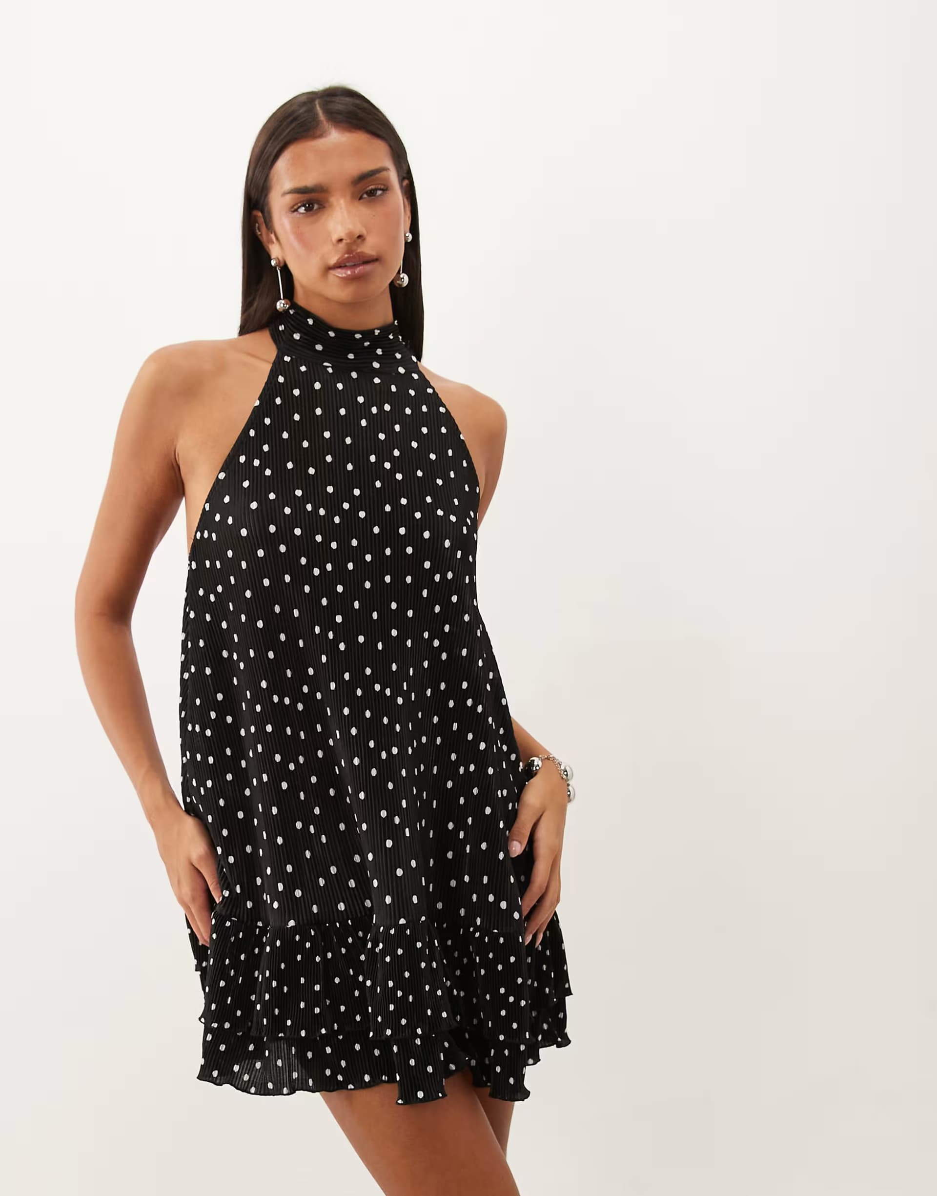 ASOS ASOS DESIGN plisse halter neck mini dress with ruffle hem in polka dot