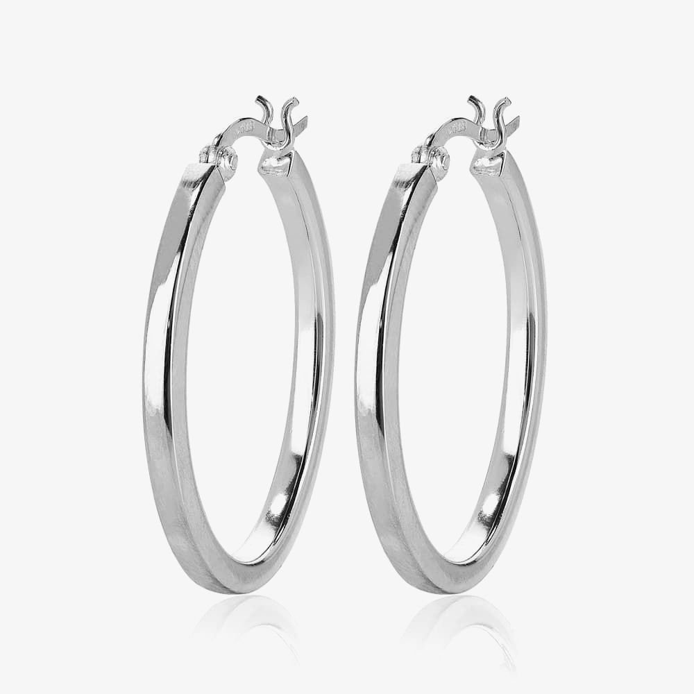 T.H.Baker T.H.Baker Women's Silver Oval Creole Earrings 8-53-3459 - 1
