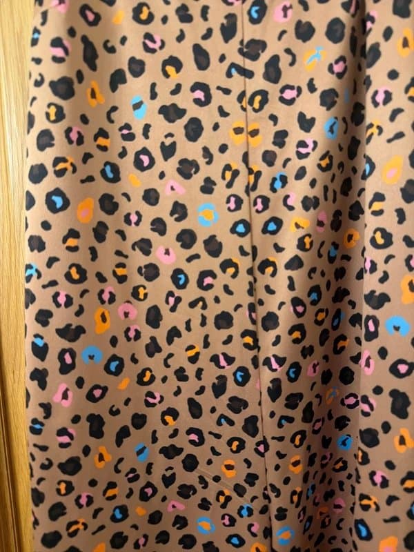 Never Fully Dressed Never Fully Dressed leopard print tie jumpsuit size 12
