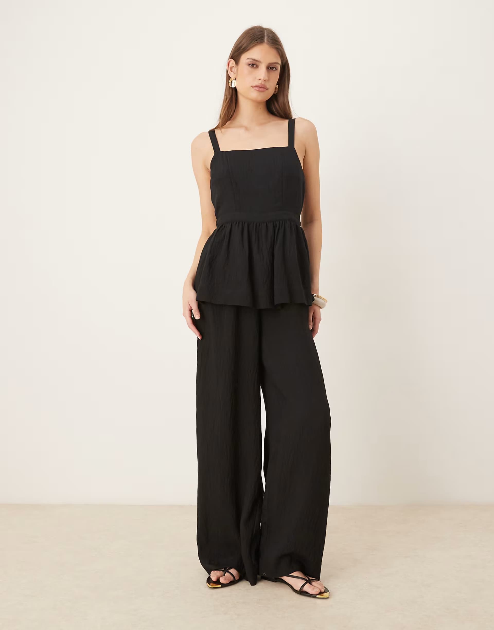 ASOS ASOS DESIGN jumpsuit with peplum waist in black
