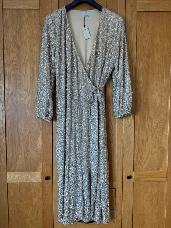 Never Fully Dressed Never fully dressed, silver sequin wrap dress size 18
