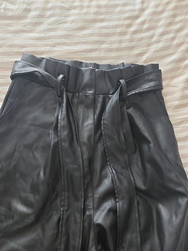 New Look Faux leather Tapered trousers with paperback waist.