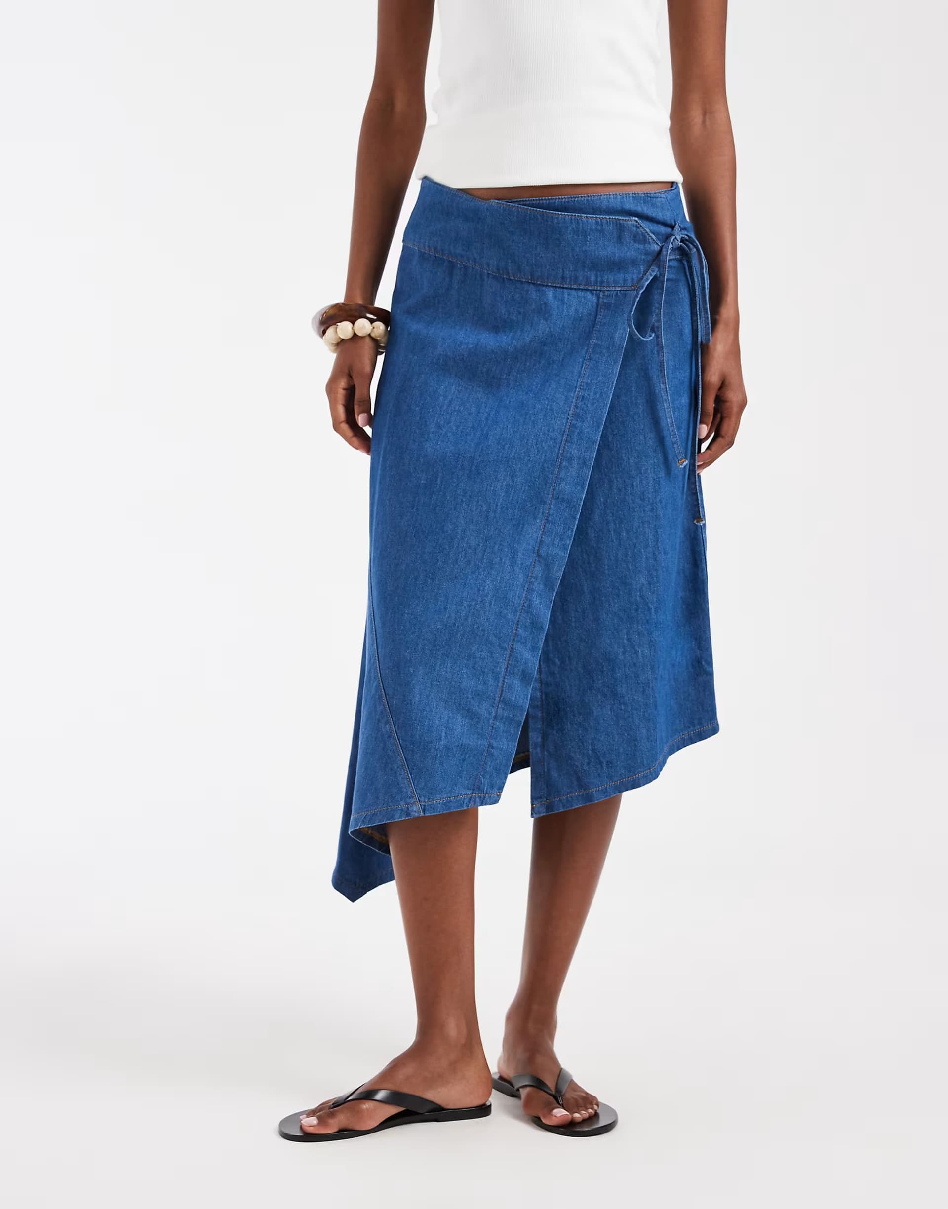 ASOS ASOS DESIGN denim asymmetric wrap skirt in mid blue
