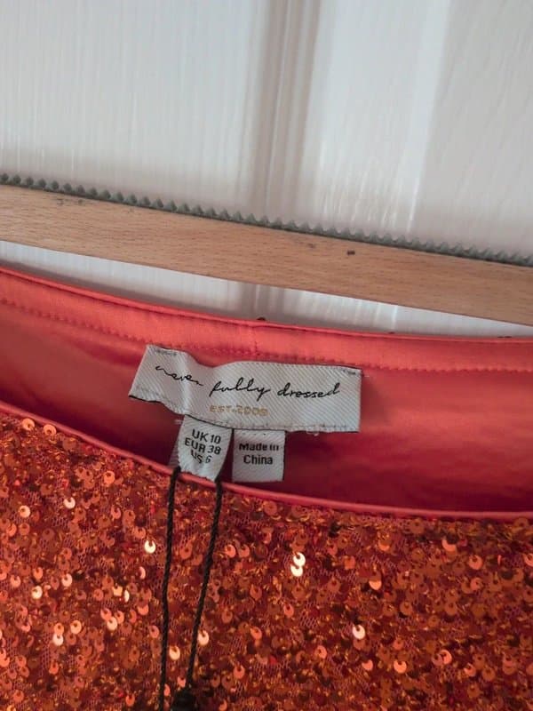 Never Fully Dressed Absolutely gorgeous Never Fully Dressed NWT Tilly Orange Sequin dress 10 petite