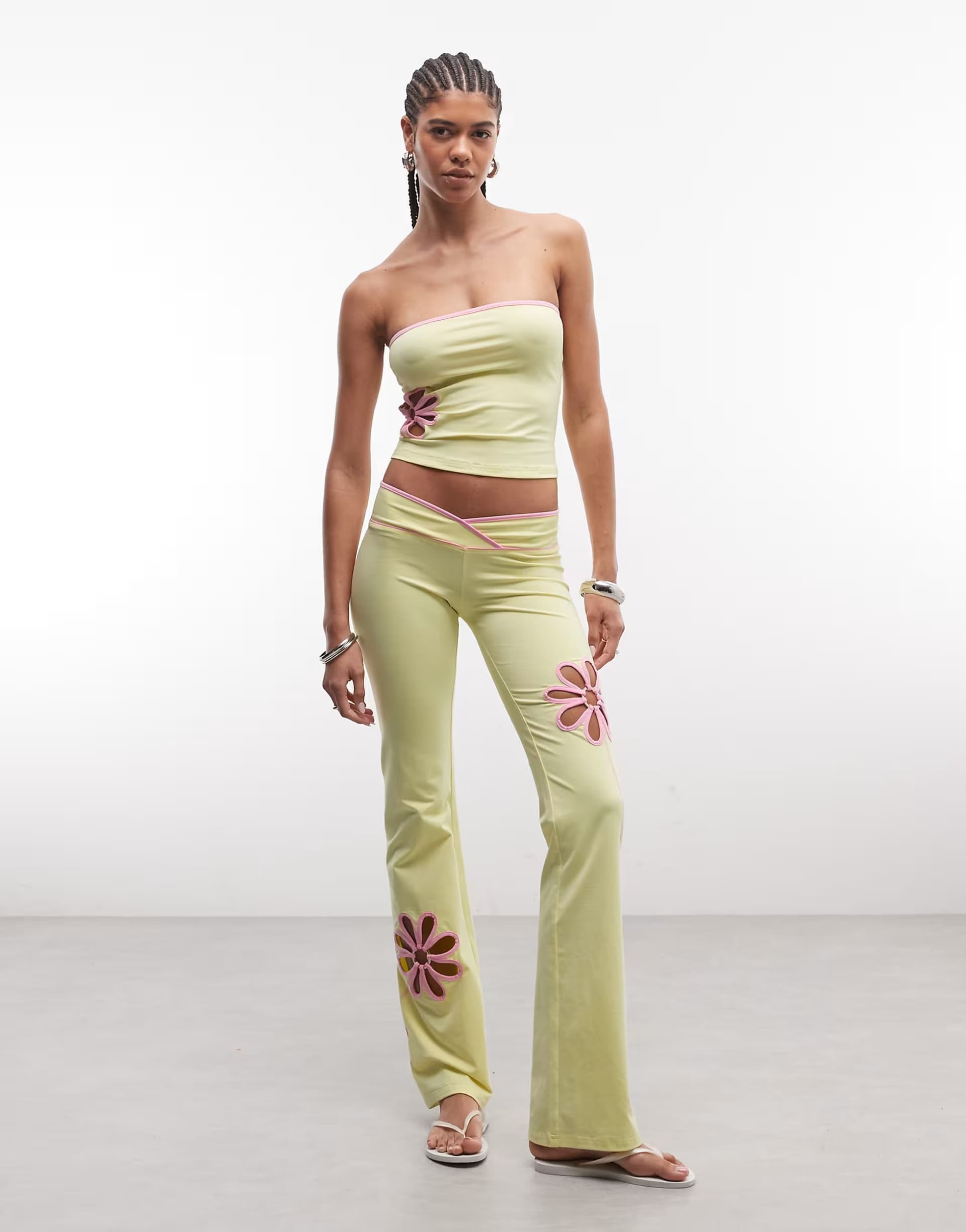ASOS I.AM.GIA Daisy bandeau contrast floral cutout boob tube and flared trousers co-ord in yellow and pink