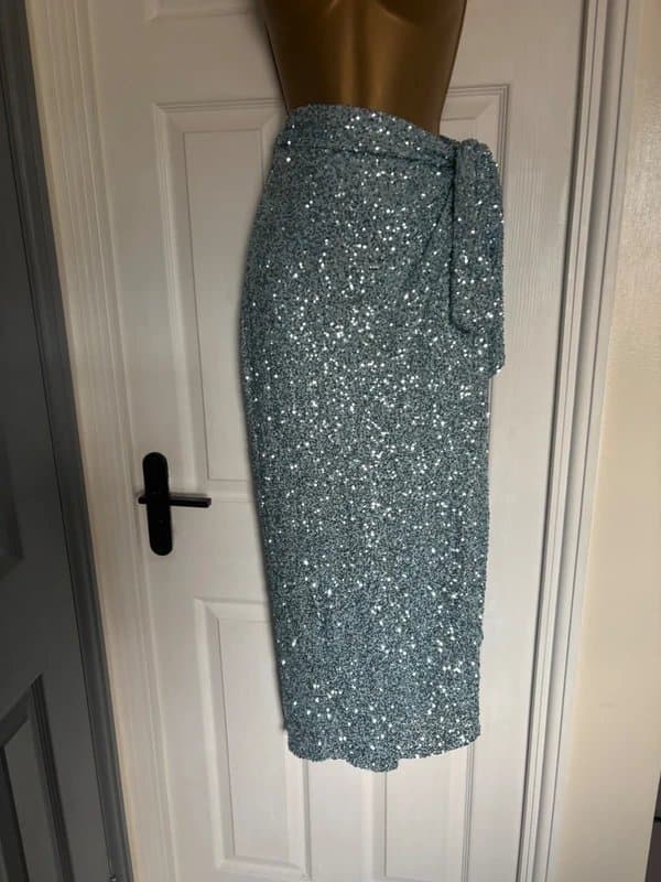 Never Fully Dressed Never fully dressed ice blue sequin wrap skirt 12